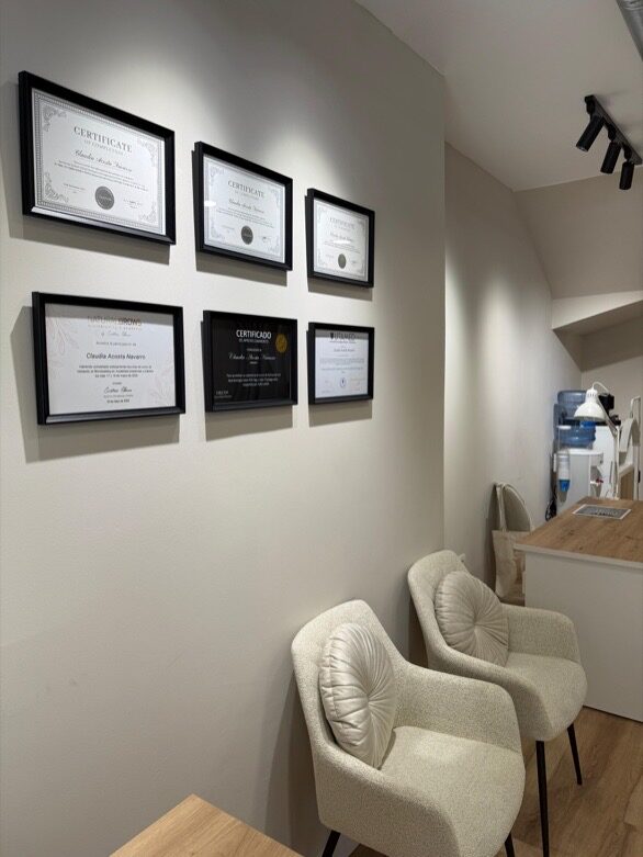 Wall with professional training certificates and diplomas